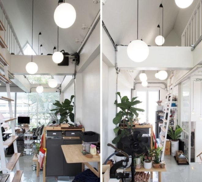 white interior with desks and plants