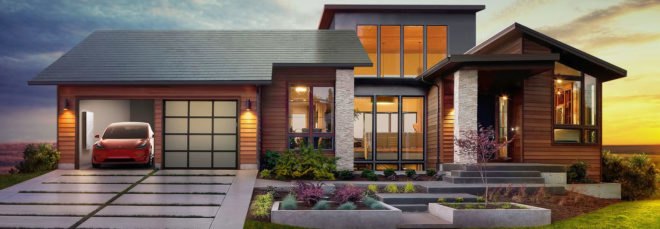 Home with a Tesla Model S in the garage and a Tesla solar roof