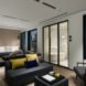 hotel room with couch and large windows