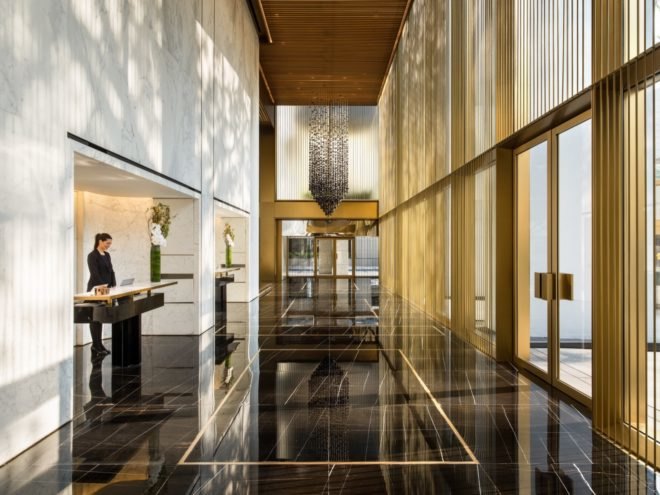 hotel lobby with black and gold decor
