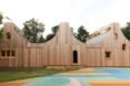 Sliding wood doors The Wooden Classroom by Studio Weave