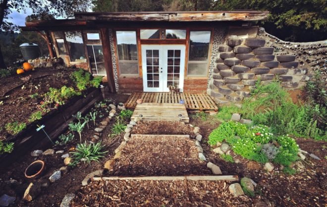 walkway leading to home with windows