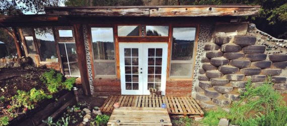 walkway leading to home with windows