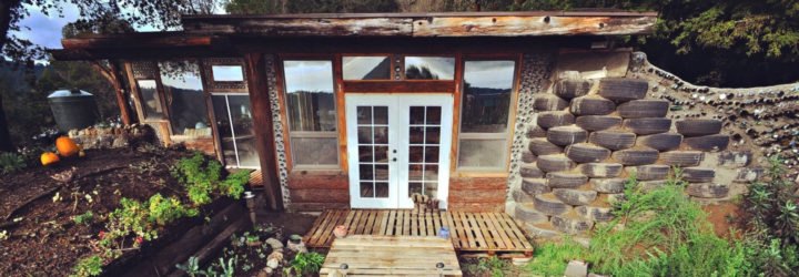 walkway leading to home with windows