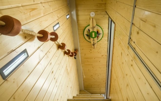 A wood-paneled stairway.