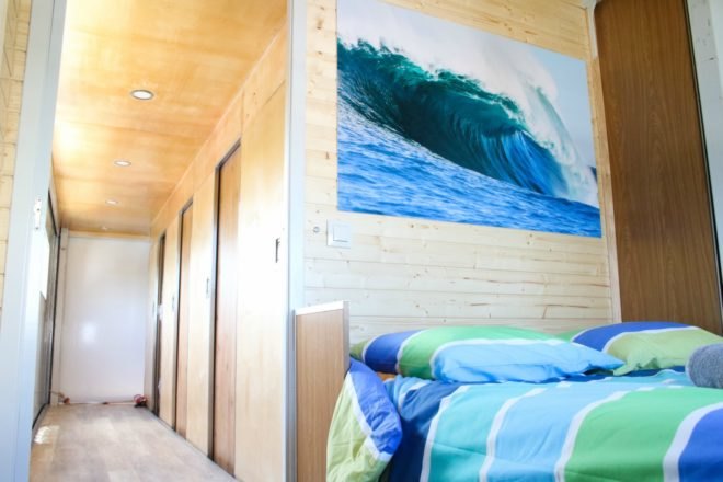 The bedroom of the Truck Surf Hotel