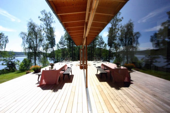Glazed east facade Villa Kaislaranta by RESORTUM and OSUMA Architects