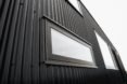 upclose shot of black structure with windows