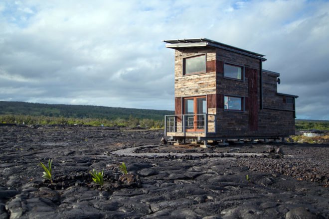 tiny home surrounded by cooled lava