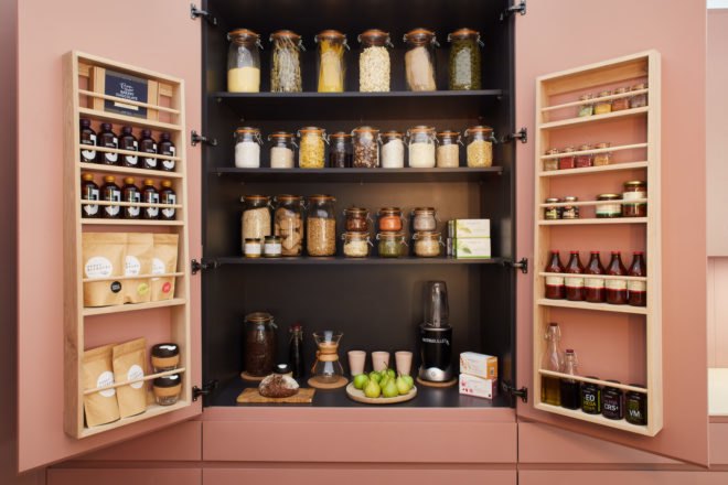 kitchen cupboard with jars and bottles
