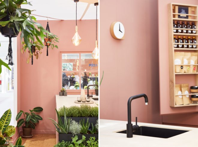 rose colored kitchen with greenery