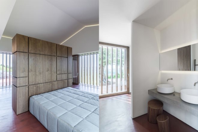 bedroom with white bed and large window