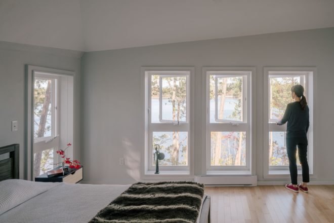 bedroom with white walls and natural light