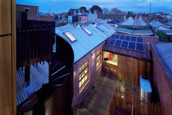 exterior view of birkenstock headquarters with solar panels on roof
