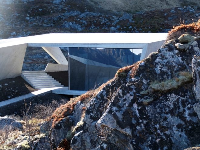 Concrete service facility with mirrored facade