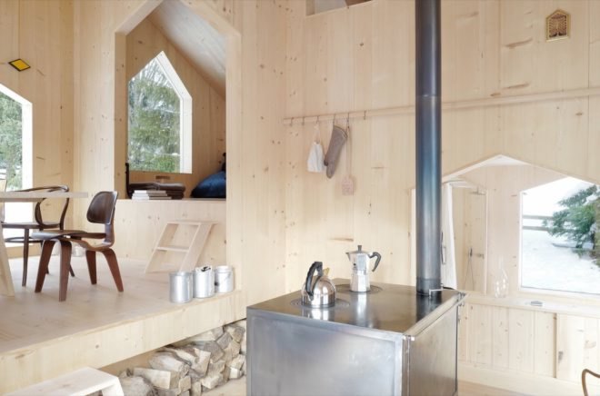 Room with stove and firewood