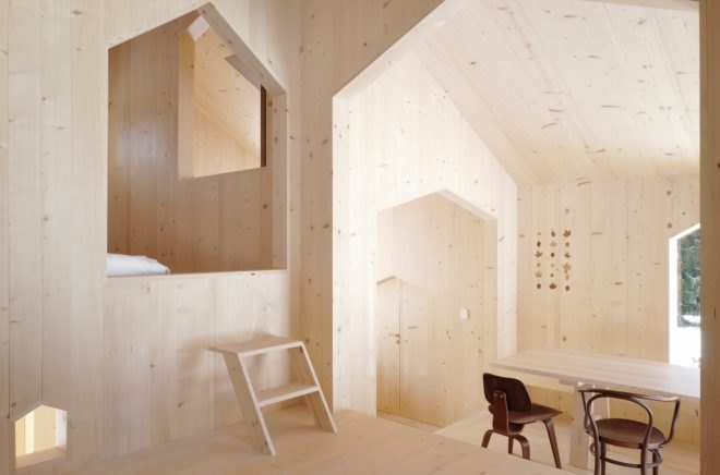 Interior with multiple levels and gabled openings leading to each separate room