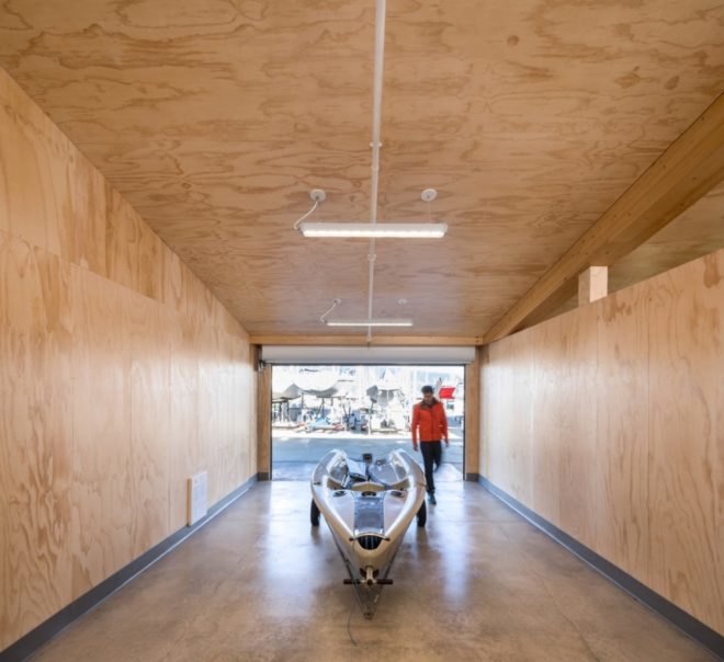 Plywood interior of one garage bay