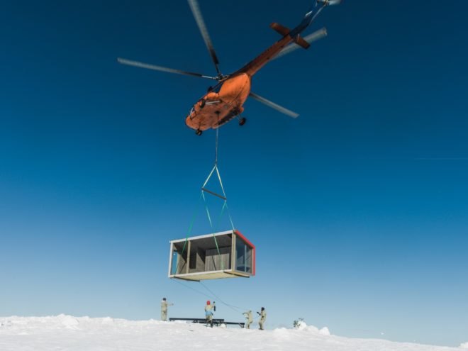 helicopter air lifts DublDom into place