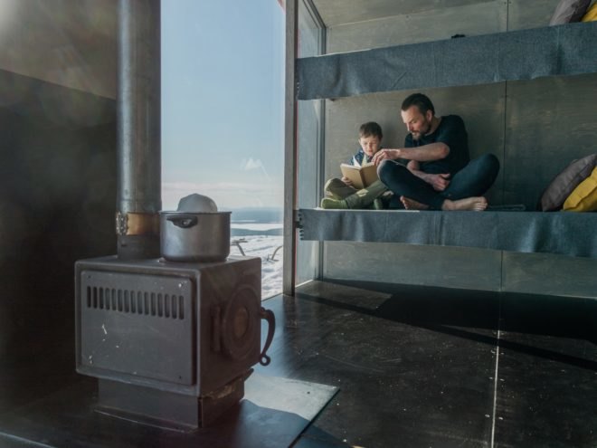people sitting on a rack bed