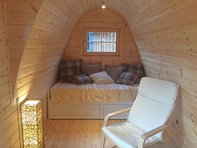 a chair with resting nook in the back