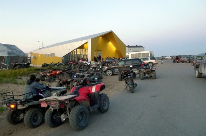 ATVs parked outside of inuit cultural center