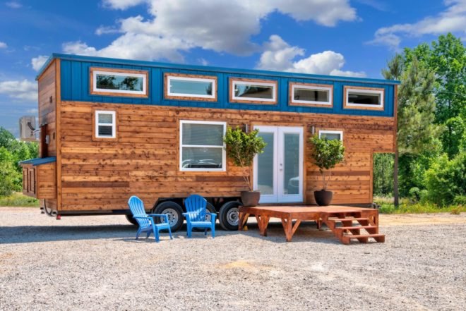 cedar tiny home with blue accents