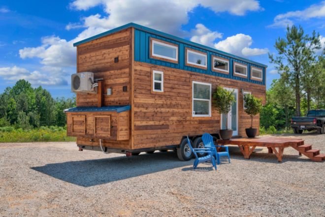 cedar tiny home with blue accents