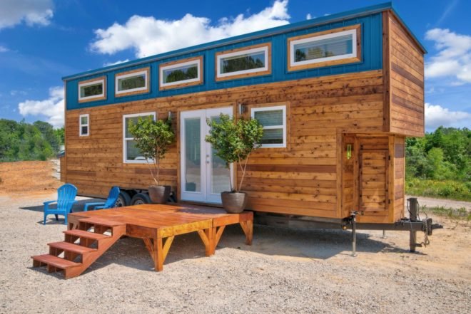 cedar tiny home with blue accents