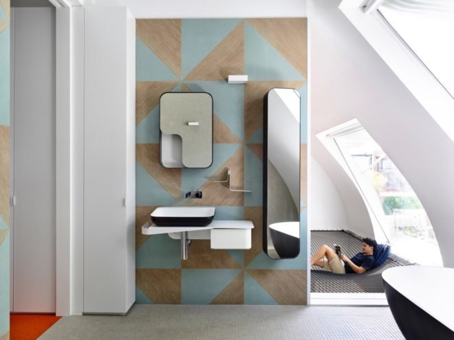 Bathroom with gray and blue patterned wall