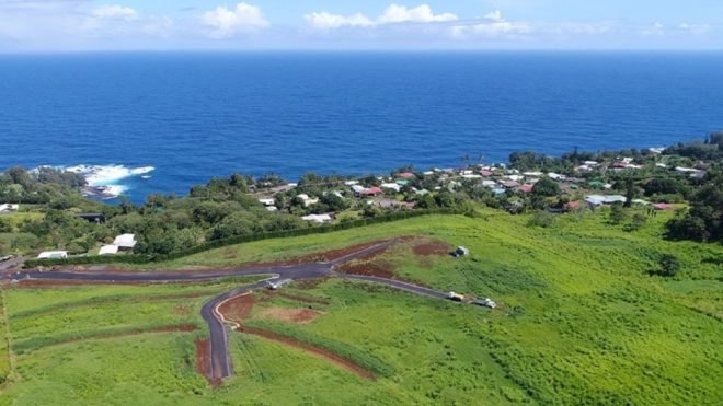 A photograph of the Kuwili Lani agrihood development by the ocean