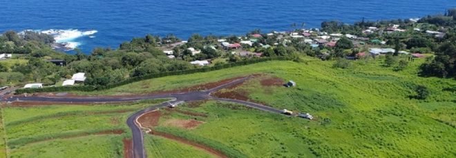 A photograph of the Kuwili Lani agrihood development by the ocean