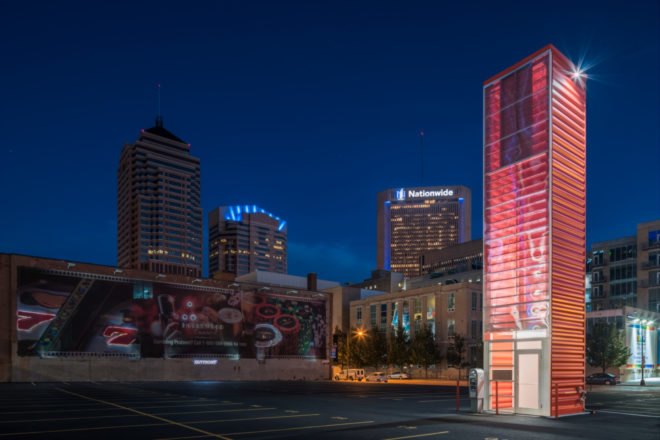 bright red tower shining in the night