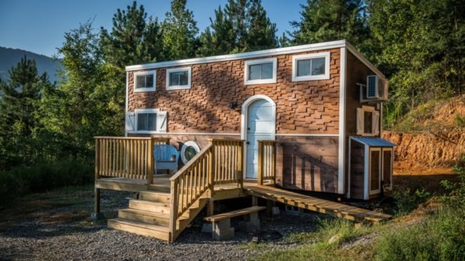 cedar clad home with front porch