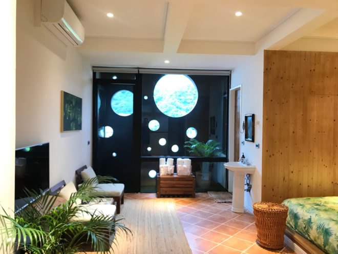 interior living space with multiple round windows