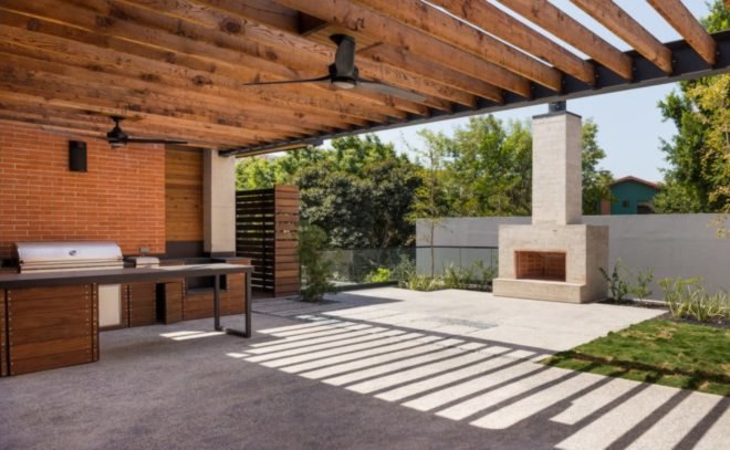 large central patio with bbq and ceiling fan