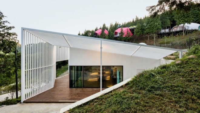 a white building with glass facade