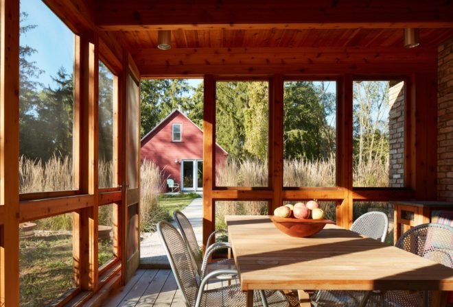 A screen-in timber porch