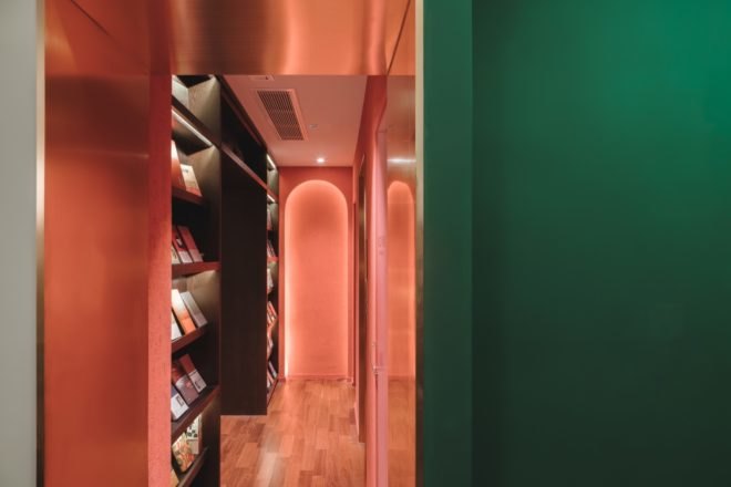 hallway view with bookshelves