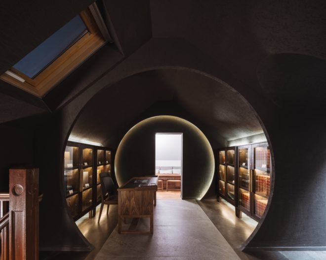 Bookshelves and a circular entryway