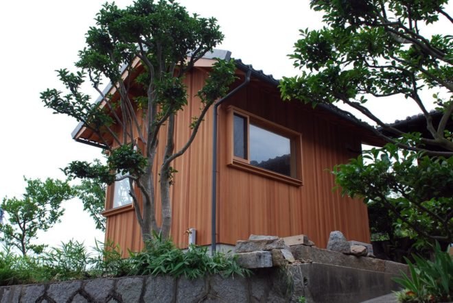 a wooden hut with windows
