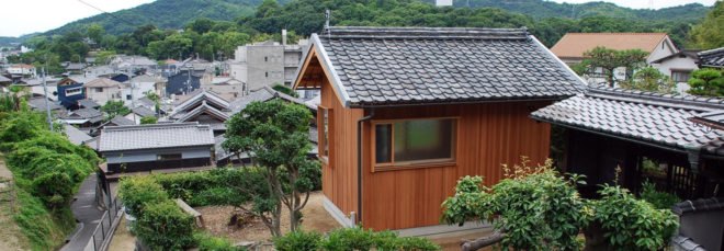 wooden hut with pitched roof