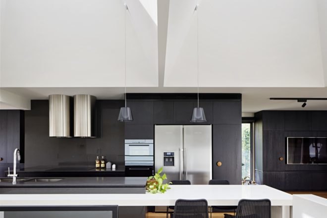 kitchen with dark cabinetry and stainless steel appliances
