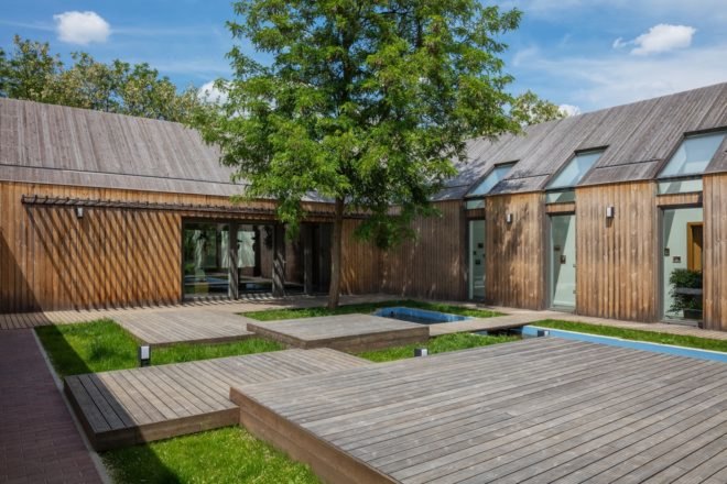 Wooden walkways between different sections of the home