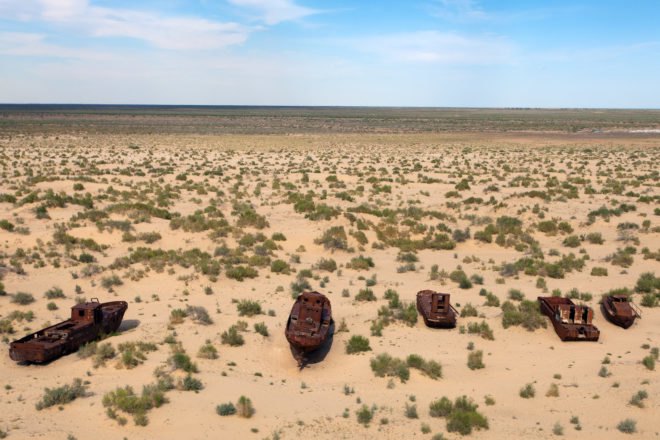 Line of old ships on the dead zone in the Aral Sea