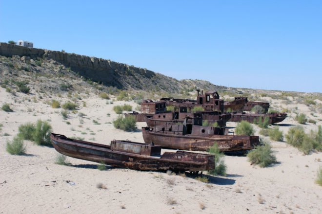 Old rusted ships on the dried up Aral Sea