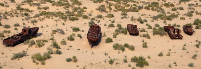 Line of old ships on the dead zone in the Aral Sea