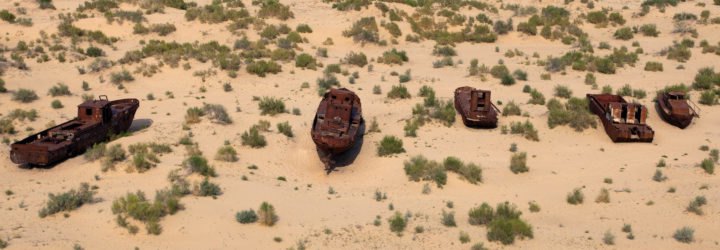 Line of old ships on the dead zone in the Aral Sea