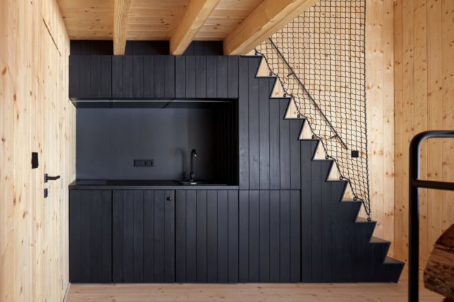 Blackened timber cabinetry in a kitchen