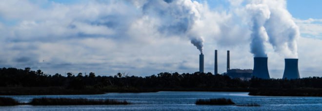 Silhouette of nuclear power plant on horizon